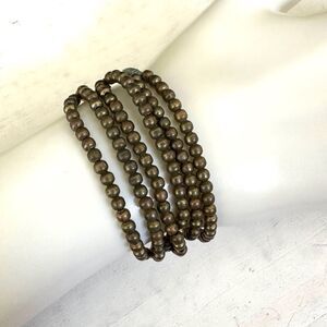 Multi strand beaded cord bracelet